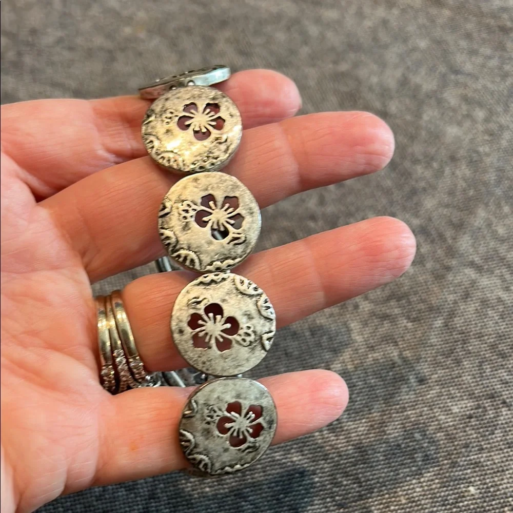 Silver medallions with floral motif bracelet